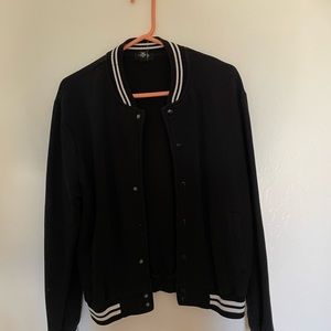 BLACK AND WHITE VARSITY JACKET